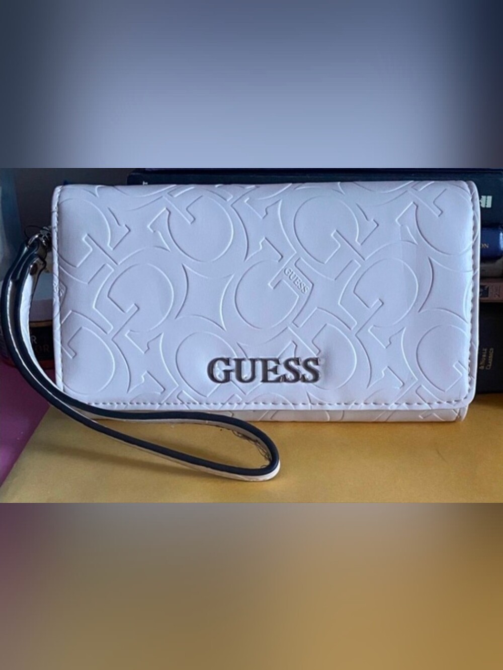 Guess Pale Pink Embossed Logo Wristlet with Silver Hardware